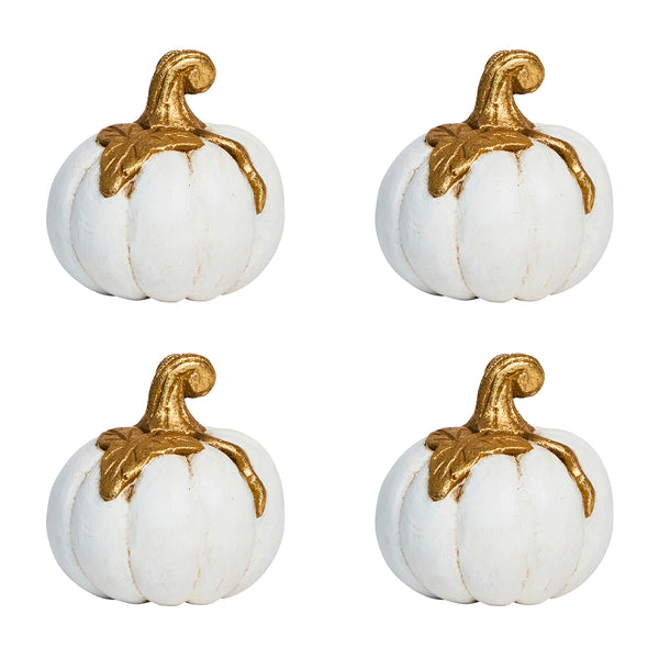 Four small pumpkins from Juliska’s Forest Walk Tabletop Collection, featuring gold stems and tops, are arranged in a grid on a white background—ideal as napkin rings or unique place card holders.