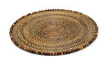 The Calaisio Round Placemat is handcrafted from natural vines and features a decorative border with alternating brown and tan beads, shown on a white background.