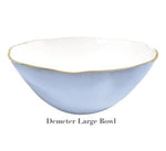 The Demeter Large Bowl from the Beatriz Ball Encanto Periwinkle Serveware Collection features a white enameled interior, pale blue exterior, scalloped gold-edged rim, and is crafted from durable aluminum alloy.