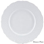 A white porcelain dinner plate from the Empire White Dinnerware Collection by Anna Weatherley, featuring a textured rim, is displayed against a plain background. "Dinner Plate" appears in the lower right corner. Made in Portugal.