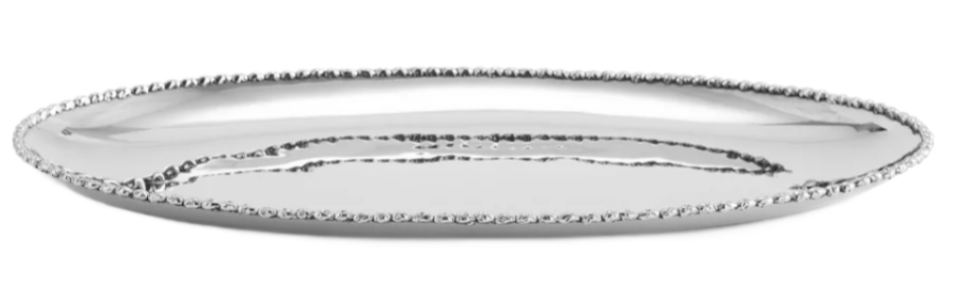 The Michael Aram Molten Oval Platter, Medium features a textured, beaded edge and contemporary design on a shiny silver finish, perfect for modern table settings.
