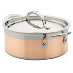 The Hestan CopperBond Copper Induction Soup Pot, 3qt, features stainless steel and copper construction, two handles, a lid, is oven safe, and sits elegantly on a white background.