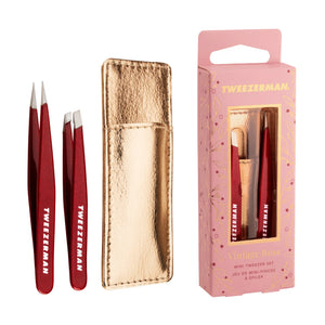 Tweezerman's Vintage Rose Gift Set features a red mini tweezer set in a gold case, displayed with its pink "Vintage Rose" packaging—essential tools for precise grooming.
