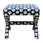 The X Ottoman by Lee Industries is a rectangular upholstered accent bench in blue custom fabric with a white circular pattern and angled legs, displayed against a white background.