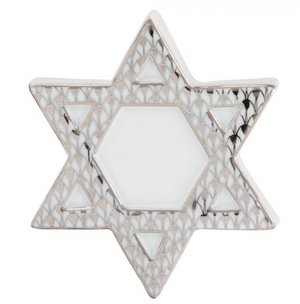 The Herend Star of David, Silver features a hexagonal center and showcases artistic appreciation with hand-painted designs on each point.