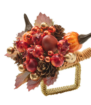 The Kim Seybert Cornucopia Napkin Ring features artificial red berries, pomegranates, pinecones, gold ornaments, and fall leaves—a festive accent for Thanksgiving or autumn table decor.