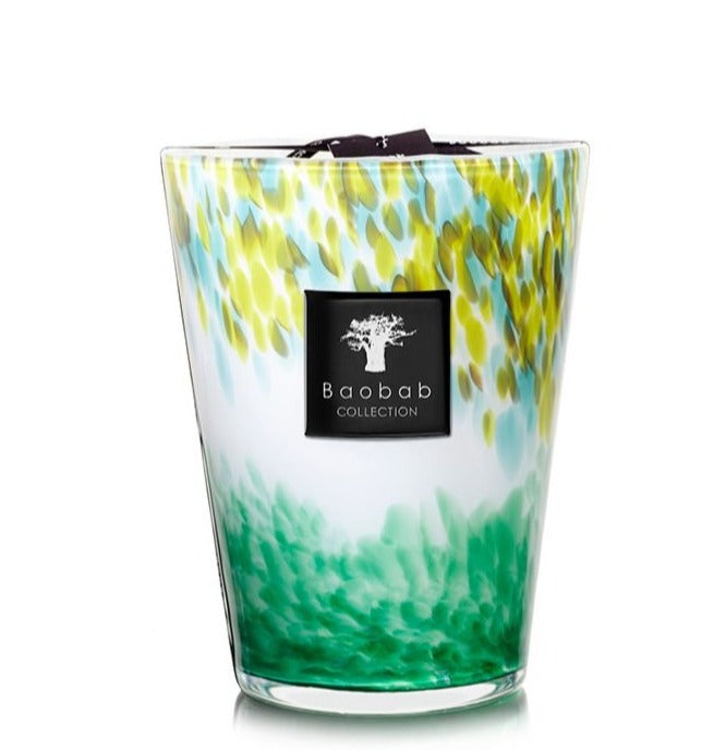 Decorative Baobab Collection Eden Forest candle in a multicolored glass container with a white, yellow, and green design.
