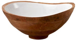 The Madras Bowl Collection by Be Home features handcrafted mango wood bowls with a smooth, asymmetrical design and glossy white interior, all sustainably sourced for conscious living.