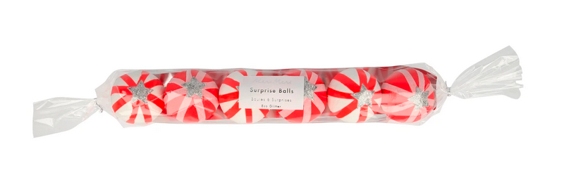 A clear wrapper holds six Meri Meri Peppermint Candy Surprise Balls, red and white striped with silver stars—ideal festive stocking fillers or charming party bag treats.