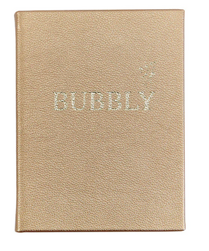 The "Bubbly" notebook by Graphic Image features a gold textured cover with "BUBBLY" in sparkly letters—ideal for recording your favorite champagne cocktail and festive drink recipes.