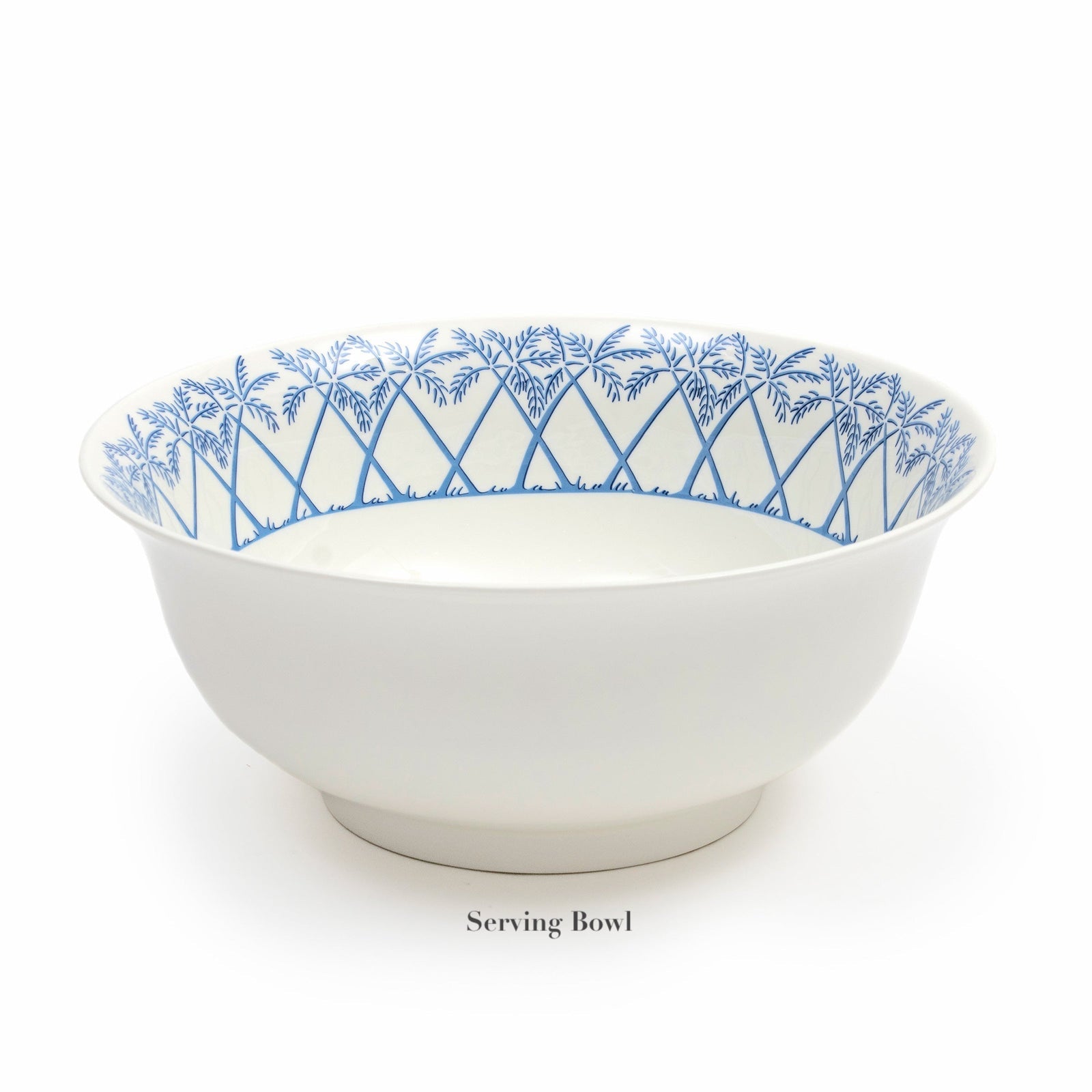 The Azure Blue Dinnerware Collection serving bowl by Pink House Mustique features a blue palm tree pattern on fine bone china, displayed on a white surface with a "Serving Bowl" label underneath.