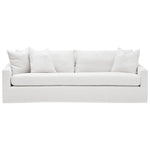 The Duke Sofa by Verellen is a modern white three-seater made from sustainably harvested hardwood, featuring straight edges, a hand-tied seat for comfort, and four matching cushions.