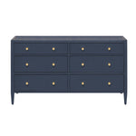 The Jarin Dresser Collection by Made Goods features a navy blue six-drawer linen dresser with gold round knobs, tapered legs, and smooth European glides, shown front-facing against a white background.