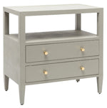 The Made Goods Jarin Nightstand is a light gray linen piece with two drawers featuring round gold knobs, European glides for smooth use, and an open shelf above the drawers.