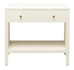 The Maris Nightstand Collection by Made Goods is a rectangular white console table with overlay drawer panels, one drawer with two round brass knobs, raised feet, and an open lower shelf.