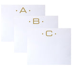 Three Gold Initial Large Notepads from Black Ink, each featuring a distinct letter (A, B, or C) and elegant dot accents, are artfully overlapped on a white background to highlight their superior quality and velvety smooth finish.