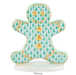 Part of Herend’s Gingerbread Man Collection, this porcelain figure features hand-painted green fish-scale designs, gold accents, a smiley face, and stands on a white base.