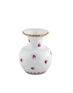The Herend Small Heart Vase in Pink is a white ceramic vase with a wide neck, adorned with hand painted pink hearts and a gold rim, shown against a plain white background.