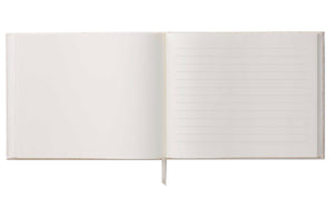 The Wildwood Embroidered Guest Book by Riffle Paper Co. features blank left pages, lined right pages, and a white ribbon bookmark at the center.