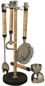 The Be Home Arendal Bar Collection features four stainless steel tools—spoon, bottle opener, strainer, and jigger—with black mango wood handles on a stand. Perfect for the master mixologist.