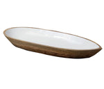 The Be Home Madras Oval Dish Collection features sustainably sourced mango wood bowls with a white interior, perfect for stylishly showcasing your favorite dishes.