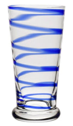 The Bella Blue Collection tumbler by William Yeoward Crystal features a swirl of diagonal blue stripes and a thick round base—an ideal way to add colour to your glassware.