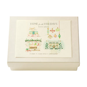 The Karen Adams Note Card Box Set comes in a cream-colored box with a festive holiday card on top and includes natural white note cards, making it the perfect seasonal hostess gift.