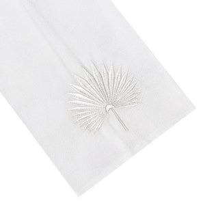 The Huck White Palm Leaf Collection napkin by Haute Home is a white cotton pique napkin with an embossed silver palm leaf in one corner for a sophisticated touch.