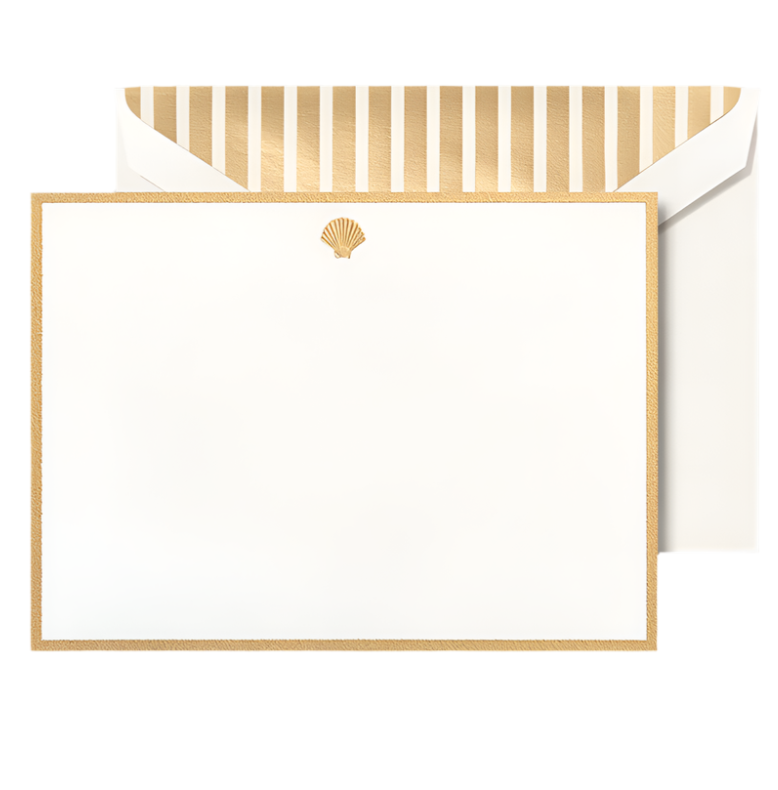 The Crane Shell Flat Card Set features cotton flat cards with a gold border and shell design, paired with white envelopes lined with gold stripes.