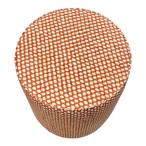The Lee Industries Outdoor Drum Ottoman in Wicker Outwick Mandarin is shown from a top angle, featuring a cylindrical design and vibrant orange patterned upholstery.