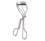 The Tweezerman Classic Eyelash Curler is made from stainless steel with curved handles and a cushioned pad, delivering a natural lash curl—an essential tool for any makeup bag.