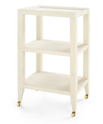 The Isadora Side Table by Villa & House features three tiers, an off-white lacquered grasscloth finish, a tray top, open shelves, and four small gold caster wheels.