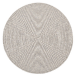 The Kim Seybert Driftwood Gray Placemat features handcrafted, small felt balls in concentric circles, offering a stylish round design that’s perfect for outdoor entertaining.