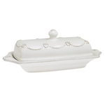 The Juliska Berry & Thread Classic Whitewash Butter Dish features a white ceramic design with a rectangular lid, ornate beaded detailing, and a knob handle.