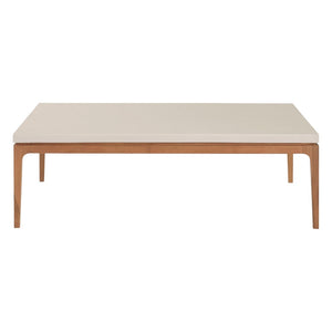 The Sloop Rectangle Cocktail Table by McGuire Furniture features a natural teak base and Bianco Crema Dune top, blending natural materials for a coastal vibe. Shown from the front against a white background.