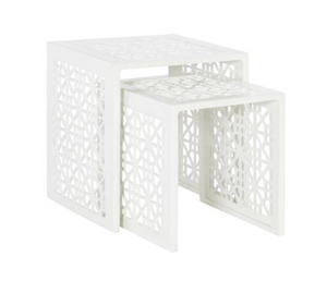 The Haret Outdoor Nesting Table by Hickory Chair features two white cast aluminum tables with geometric cut-out patterns, designed to nest together—ideal for any outdoor collection.