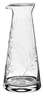 The William Yeoward Crystal Jasmine Juice Carafe features clear glass with an etched leafy vine and jasmine pattern, a tapered body, and a spout—an elegant wedding gift choice.