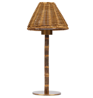 The Duggan Society Francis Bamboo Lamp is a cordless table lamp with a woven wicker shade and textured cylindrical base on a round metal platform—ideal for bringing natural ambiance to any room.