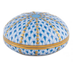 The Sea Urchin Box, Blue by Herend is a round white porcelain box featuring blue hand-painted scalloped designs with gold dots and bands in the classic Herend style.