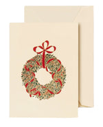 The Classic Wreath Gift Enclosure Set by Crane features a cream-colored folded card with an engraved green wreath and red ribbon, paired with a matching envelope.
