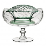 The Jasmine Footed Rose Bowl & Wire by William Yeoward Crystal features hand-engraved details and a green metal bench with a lattice dome, creating an elegant centerpiece perfect for showcasing jasmine vines or delicate flowers.