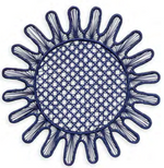 A symmetrical, circular geometric pattern with a lattice center and radiating, looped edges, inspired by Themis Z's Kyma Rattan Placemat Collection, illustrated in dark blue lines on a white background.
