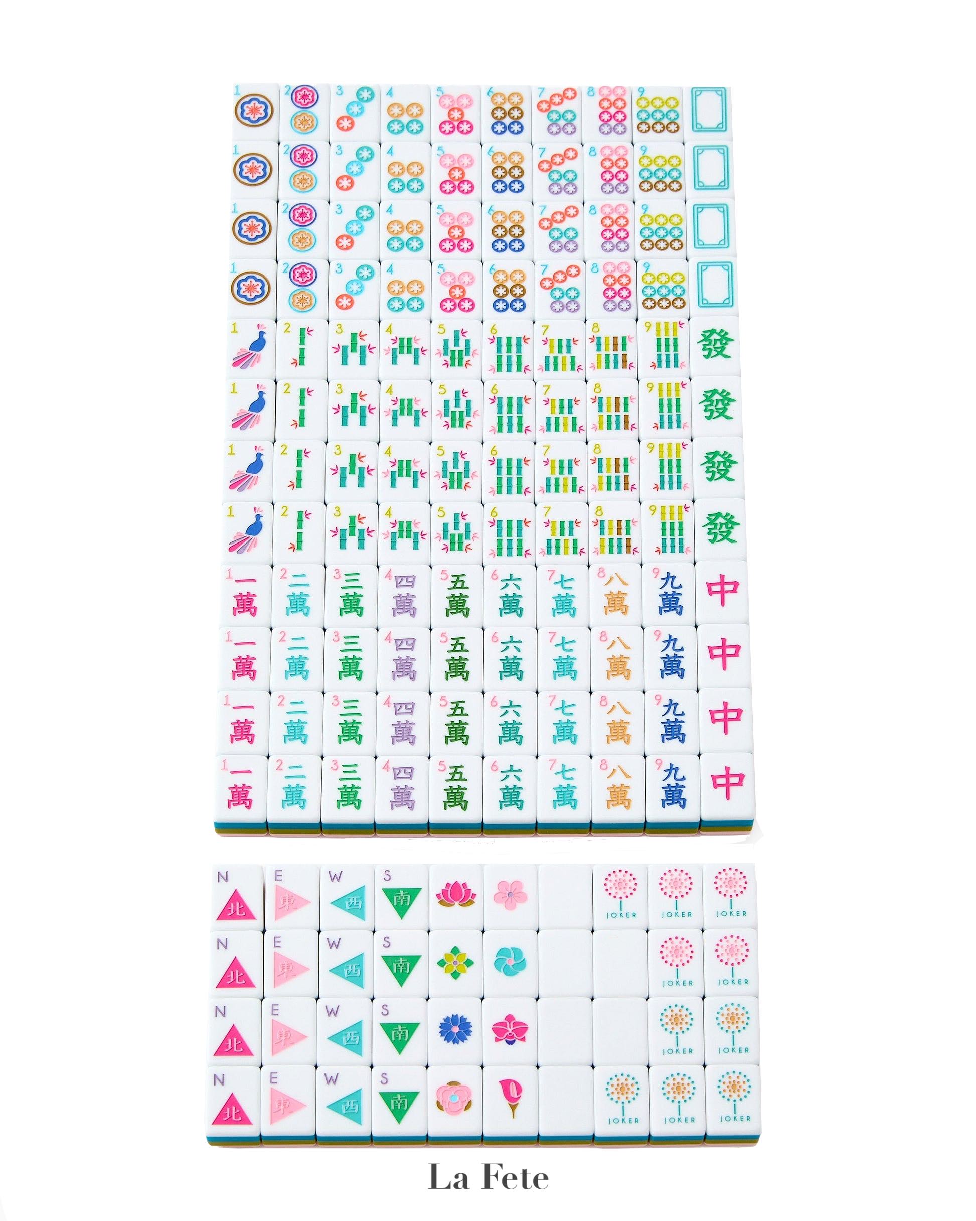 The Oh My Mahjong Mahjong Tile Collection features hand-painted tiles arranged in rows on a white background, showcasing symbols, numbers, winds, and flowers for an elevated gaming experience.