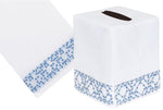 The Lido Bath Collection by Haute Home offers a white tissue box cover made from luxurious Italian linen with elegant blue geometric hand embroidery along the bottom edge.