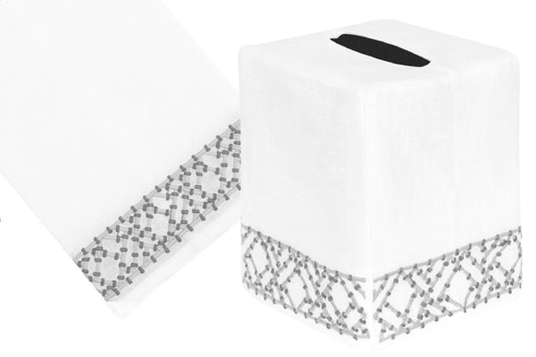 Two white Lido Collection tissue box covers with gray geometric patterns, one standing vertically and the other lying horizontally by Haute Home.