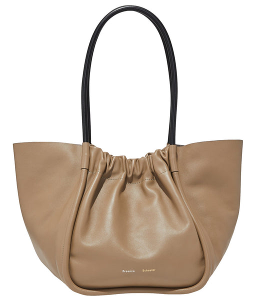 A beige Proenza Schouler Large Ruched Tote tote bag with black handles and a subtle logo on the front.