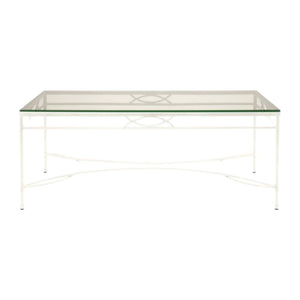 The Amalfi Cocktail Table in White Vermouth by Janus et Cie features a rectangular glass top, white metal frame, and decorative crossbar—perfect for stylish outdoor spaces.