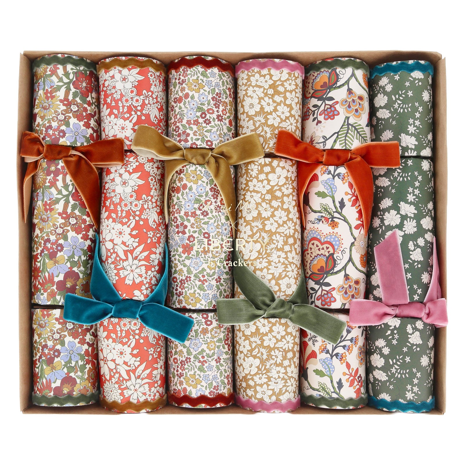 Add charm to your fall table with Meri Meri's Liberty Fall Velvet Bows Crackers—a box of eight floral crackers, each tied with colorful velvet bows and arranged in two neat rows.