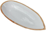 The Be Home Madras Oval Dish Collection features a white, leaf-shaped serving bowl with a sustainably sourced mango wood rim—an elegant modern update to classic oval dishes.