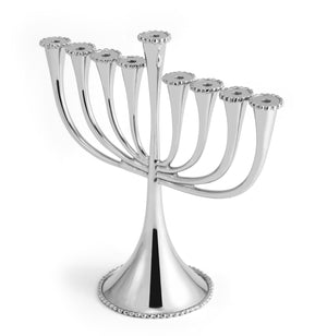 The Michael Aram Molten Menorah features nine silver candle holders, including a central elevated one. Its contemporary, handcrafted design is elegantly displayed on a white background.